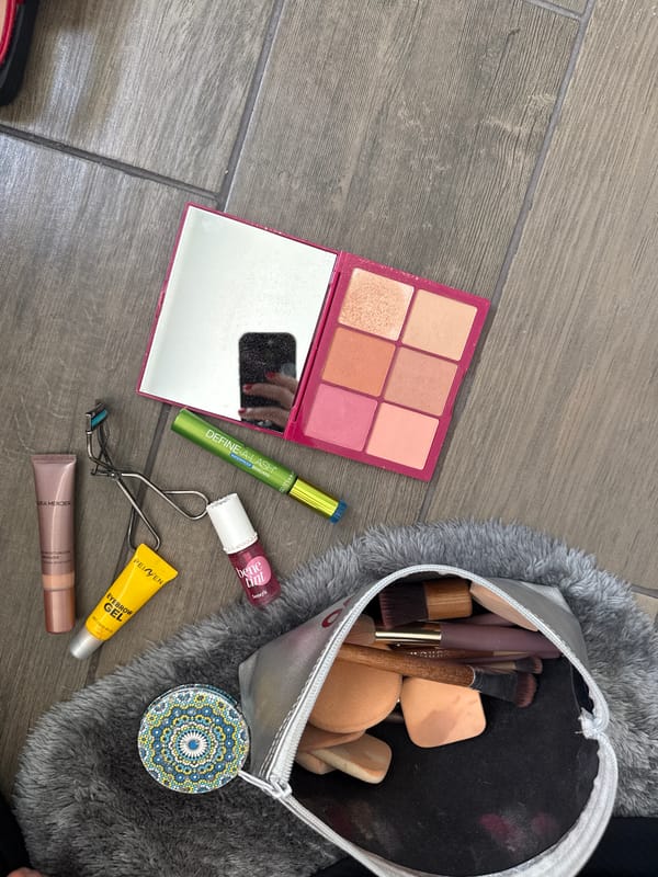 Person documents evening makeup routine in Mexico City apartment