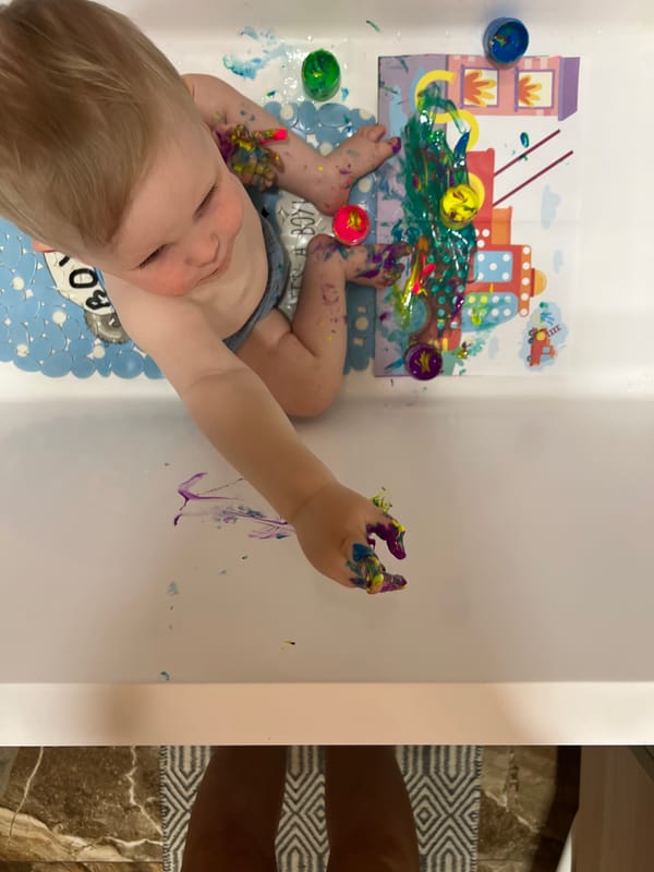 Child's Paint-Covered Art Session Captured in Khimki Bathroom