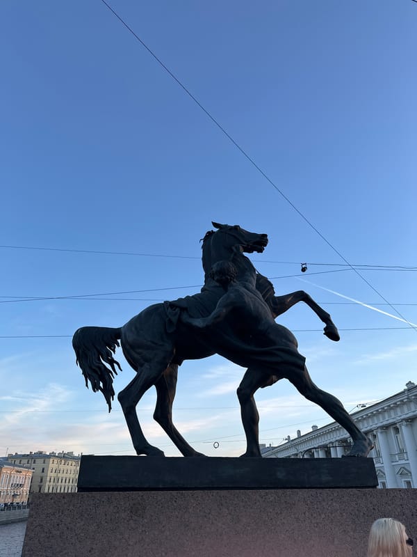 Tourist documents Saint Petersburg landmarks and streetscapes during afternoon walkabout