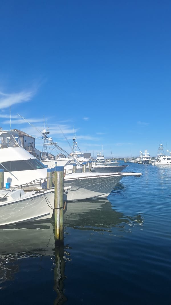 Boats docked on a sunny afternoon at Nantucket Harbor