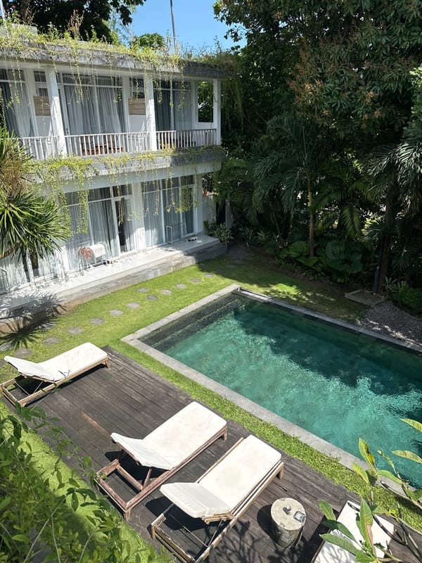 Modern building with vegetation observed near pool in Pererenan