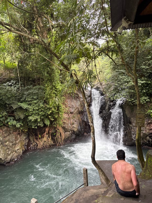 Morning waterfall recreation activity captured in Sukasada Indonesia