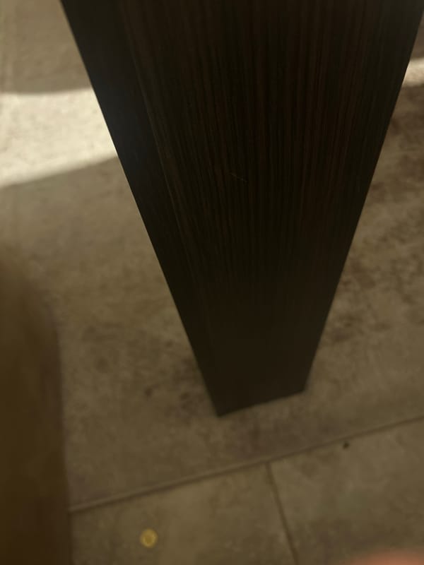 Floor-level documentation of dining room furniture captured over 24 minutes