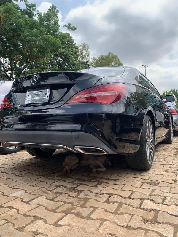 Car dealership activity documented in Abuja during morning hours