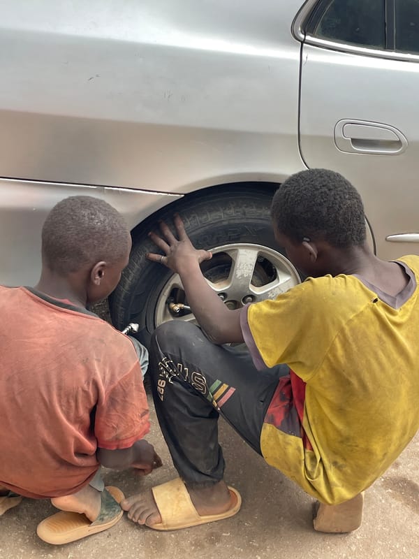 Daily life documented across Jos Nigeria streets during afternoon