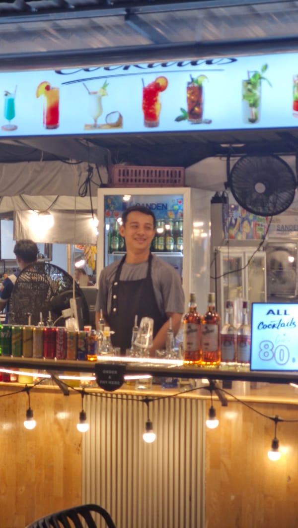 Night out at a street food market with shawarma and scooters