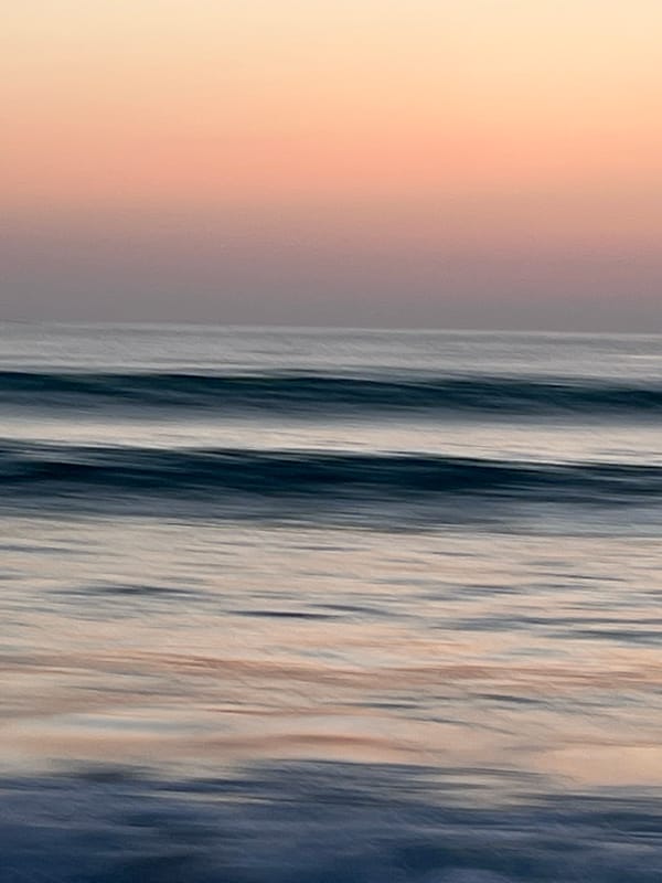 Sunset surfing session documented at A Coruña beach