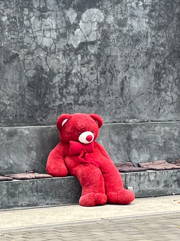 Red teddy bears displayed around North Kuta boutique district