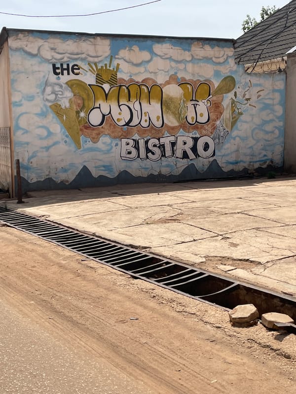 Street art mural spotted at Cookie Bistro in Jos