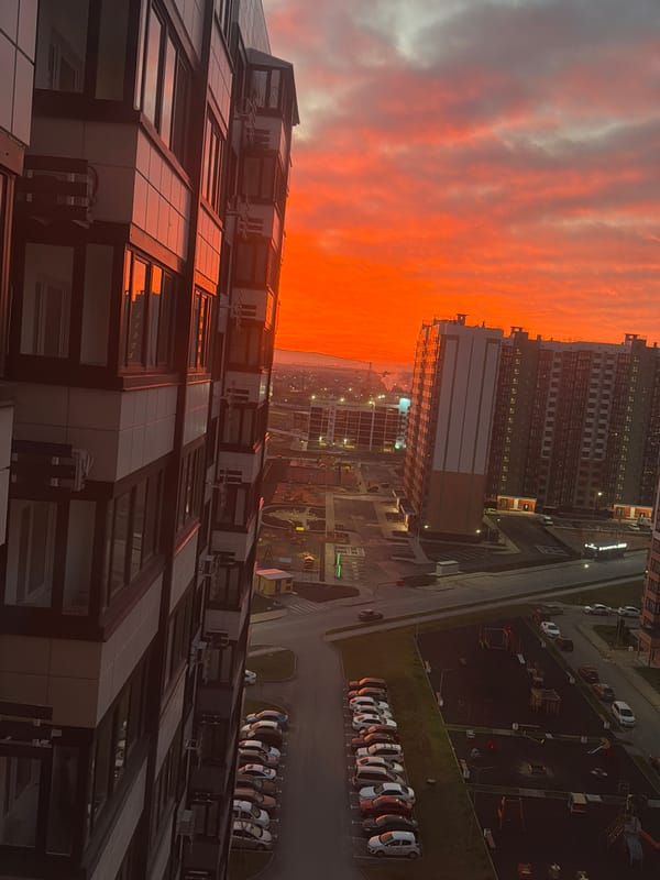 Vibrant sunset illuminates Anapa cityscape with fiery colors