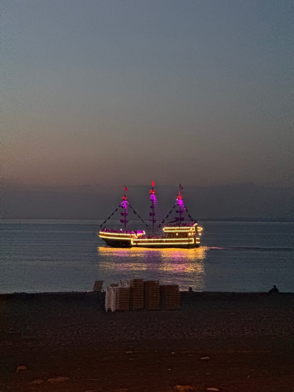 Sunset boats observed on Black Sea coast in Batumi