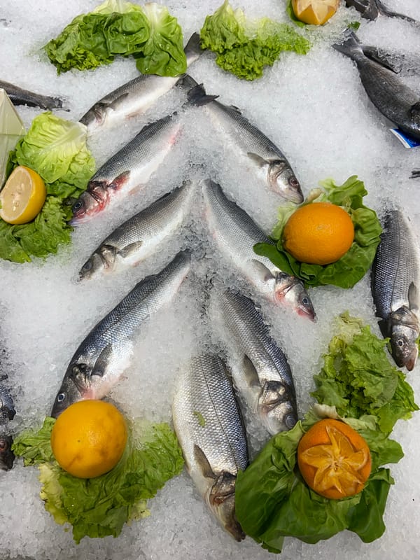 Fresh fish display observed at unknown market location