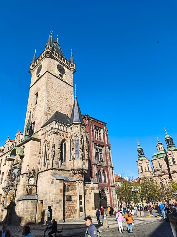 Prague landmarks photographed under clear morning skies