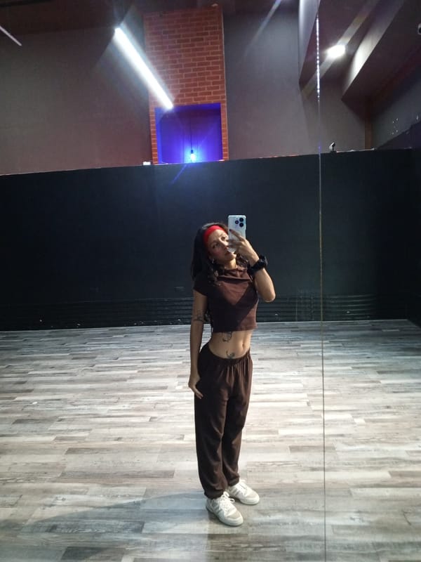 Woman records selfie content at Pampatar fitness studio