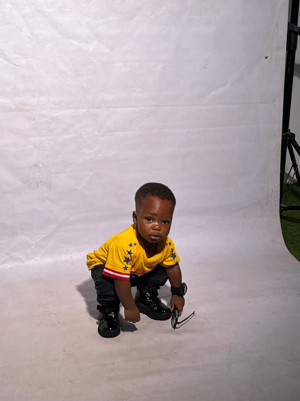 Children's traditional portrait session documented in Nigerian studios