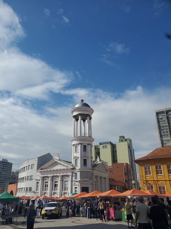 Curitiba street scenes captured: historic building, food, art, toys
