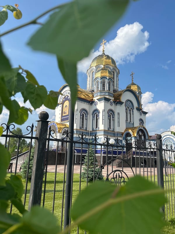 Orthodox churches and modern buildings in Kemerovo, Russia