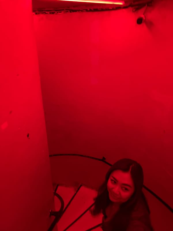 North Kuta nightclub glowing red, DJ set in full swing