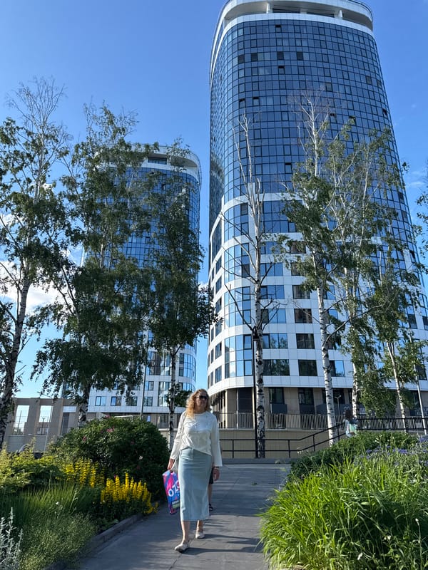 Visitors document modern Izhevsk cityscape and gardens