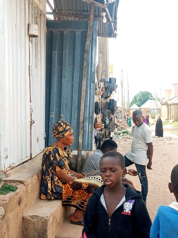 Midday street and market life across small-town northeastern Nigeria