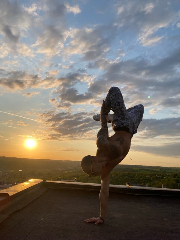 Acrobatic rooftop performance captured at sunset in Pleven, Bulgaria