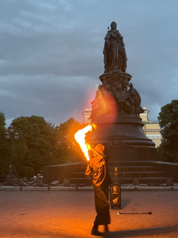 Fire performers entertain crowds at Saint Petersburg monuments