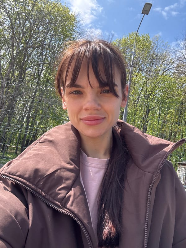 Woman takes selfies in sunny Rostov-on-Don morning
