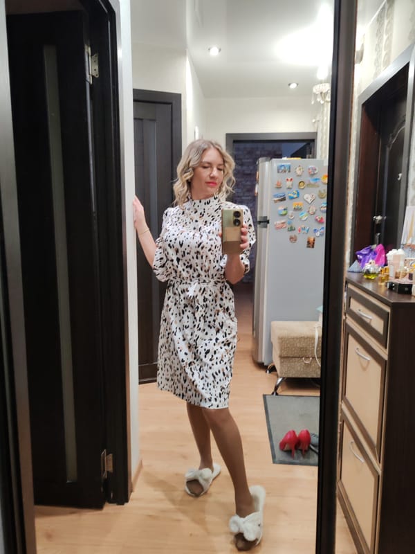 Woman takes mirror selfies in Petropavlovsk-Kamchatsky apartment