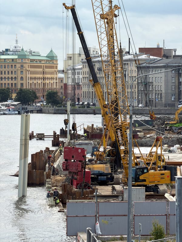 Neva River waterfront: construction, hydrofoils, and city views