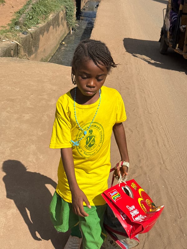 Everyday street life moving through Onitsha, Nigeria