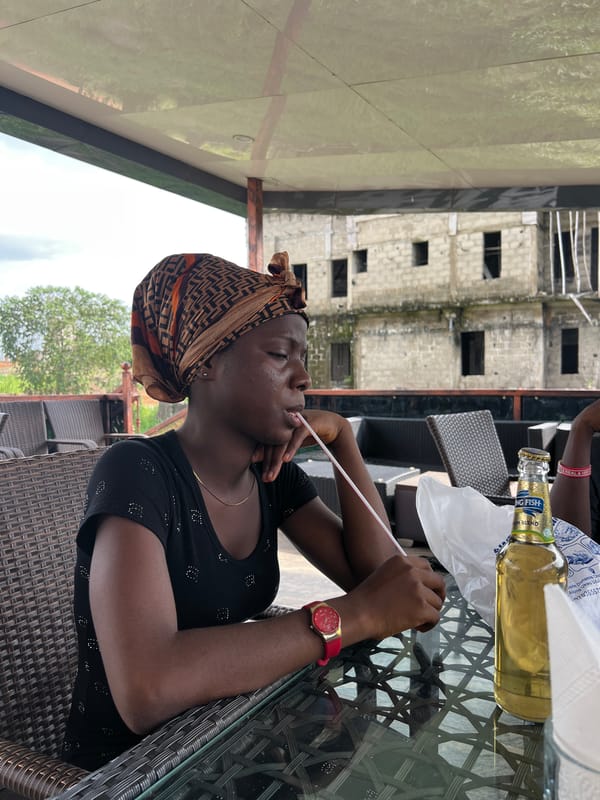 Casual drinks and downtime at an outdoor spot in Onitsha
