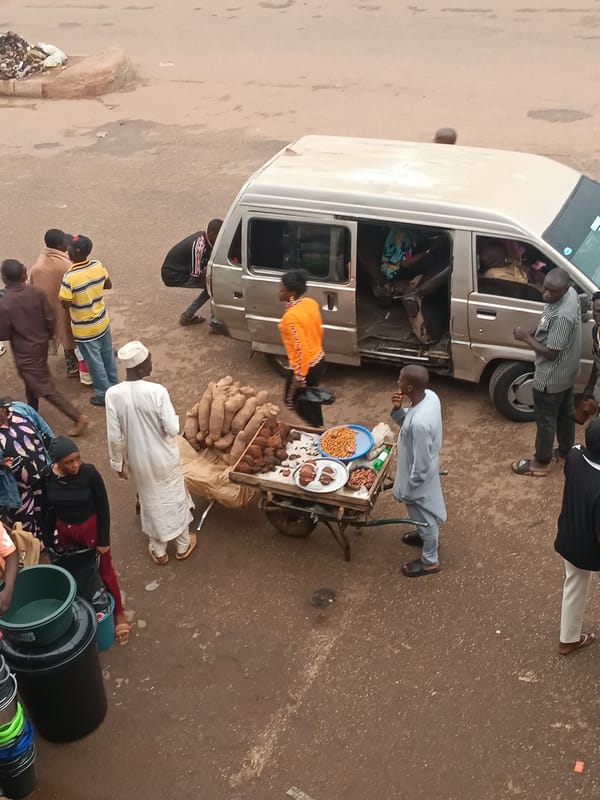 Afternoon street commerce and pedestrian activity captured in urban area