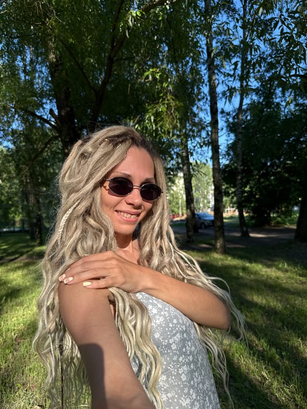 Woman takes selfie in Rusanovo park