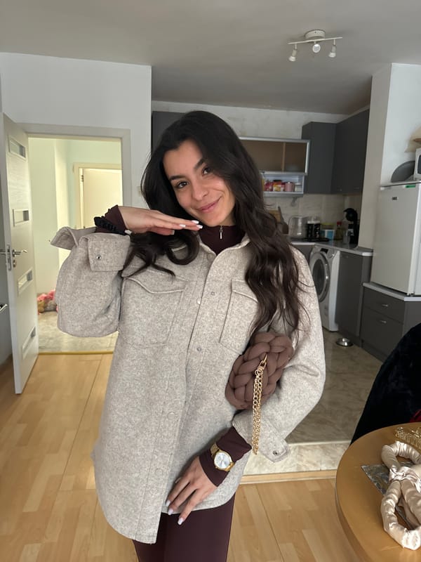 Woman spotted indoors in Varna wearing brown outfit