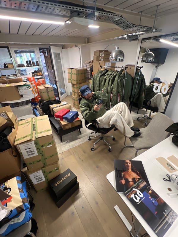 Office worker takes break with phone in London workspace