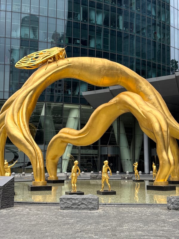 Golden cicada sculpture documented in Guangzhou's Tianhe District