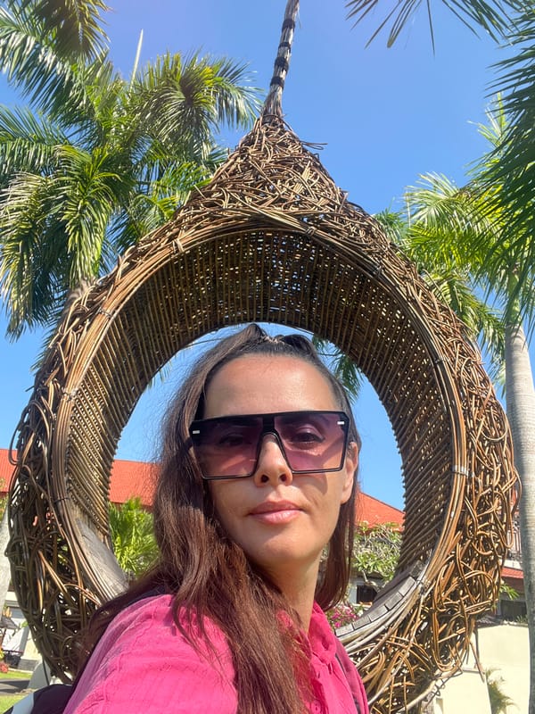 Selfies at woven nest swing in Kuta Selatan