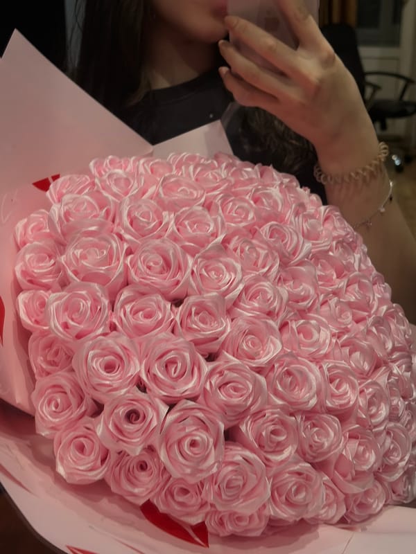 Personal celebration documented with gifts, flowers, pet in Tuymazy