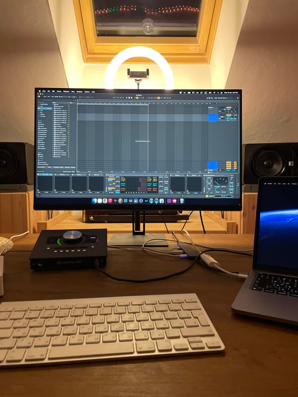 Music production studio setup documented with professional equipment