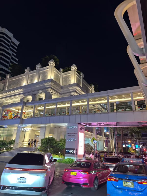 Nighttime street scenes captured around Bangkok's Erawan shopping district