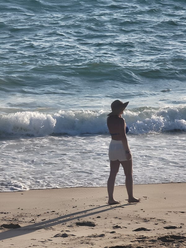 Quarteira beach alive with late afternoon activity along the Atlantic.