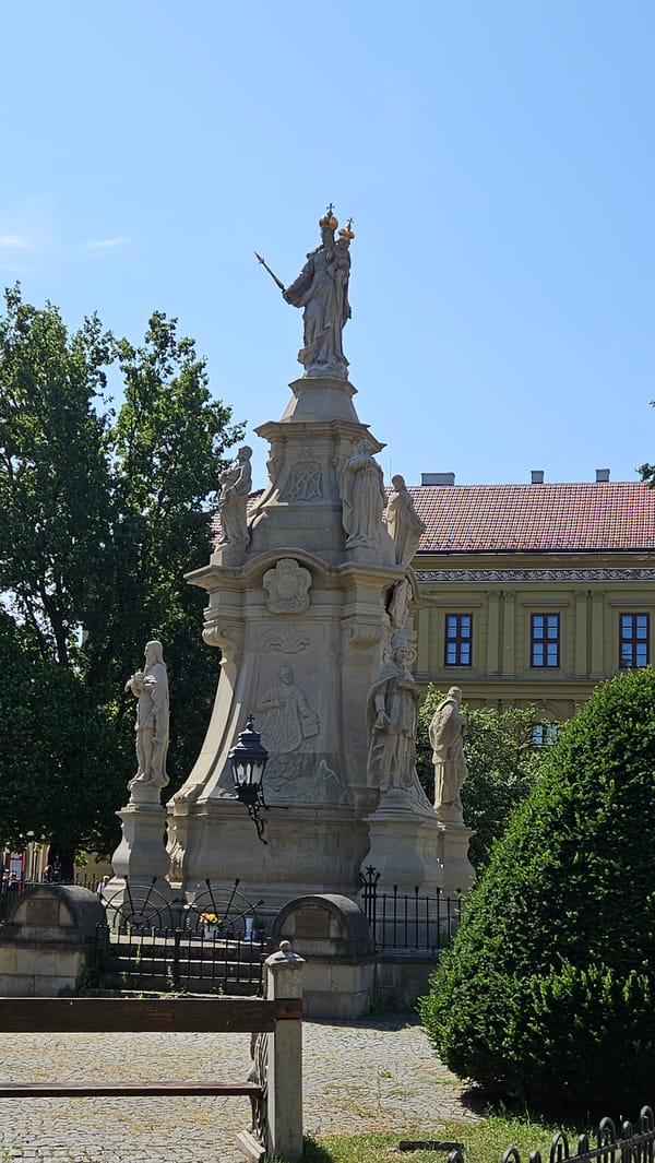 Strolling through Prešov's historic pedestrian center on a sunny morning