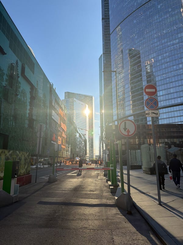 Modern glass buildings and street signs observed in Khimki