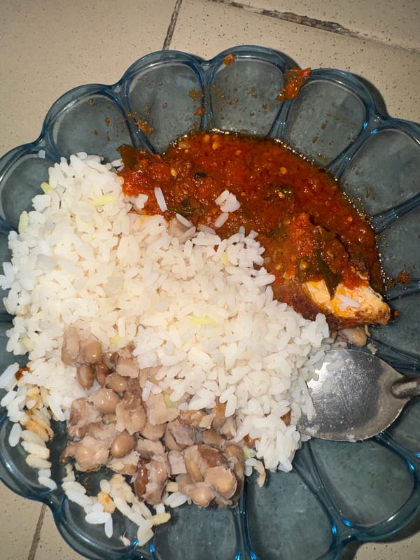 Traditional meal served on decorative plate in Sabon Tasha