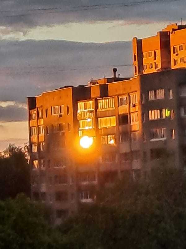 Sunset illuminates apartment buildings in Elektrostal, Russia