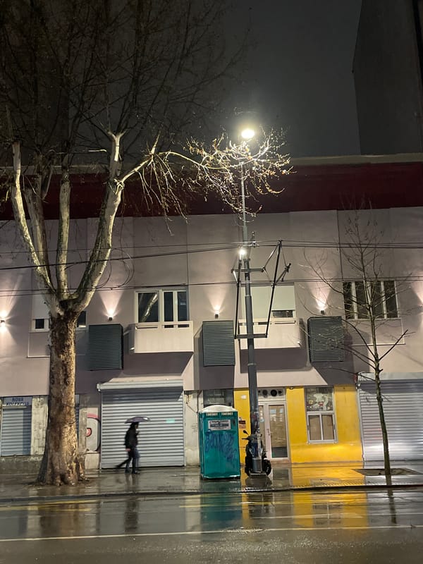 Nighttime street scene captured in Belgrade mixed-use building