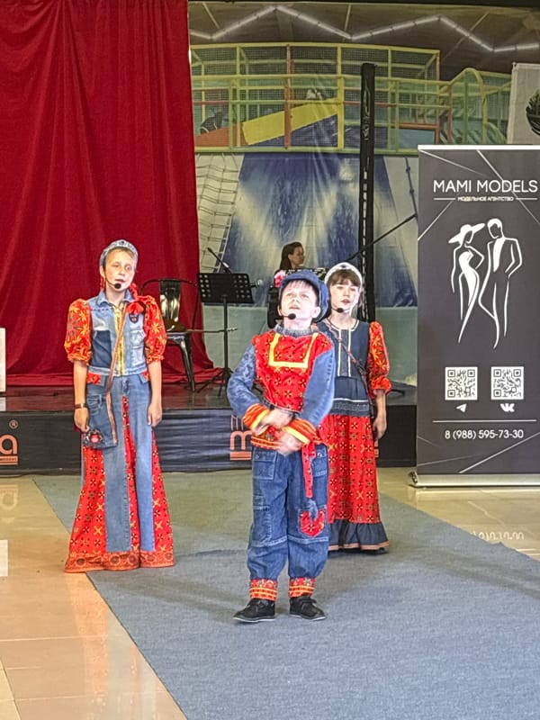 Children's cultural fashion show on stage in Astrakhan