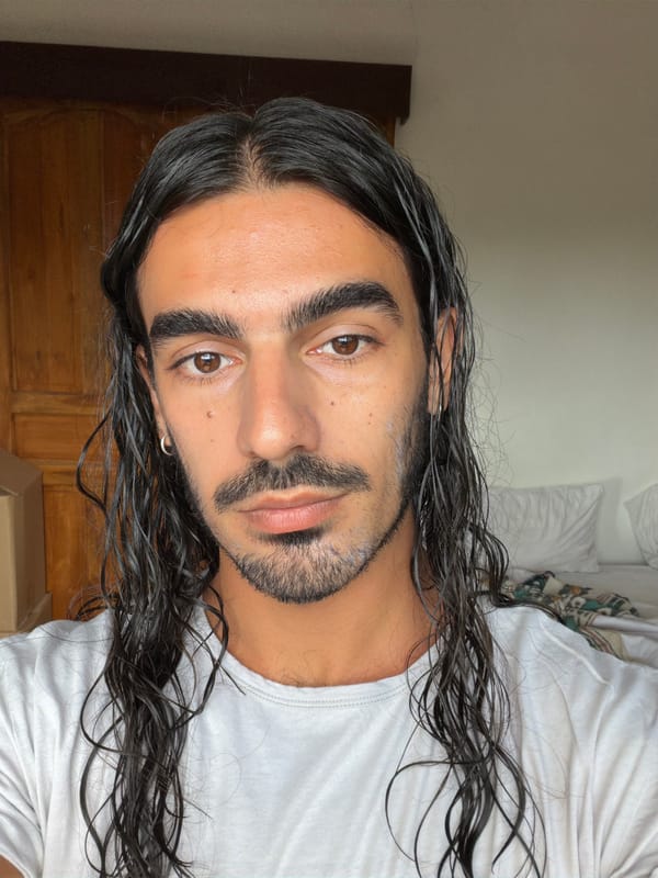 Man documents late-night mirror selfies in North Kuta bedroom