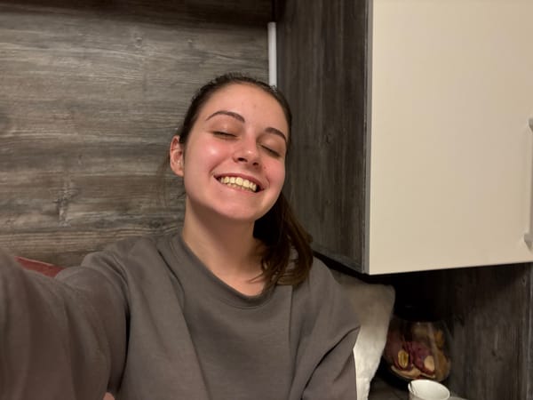 Woman takes joyful selfies in Bulgarovo, Bulgaria