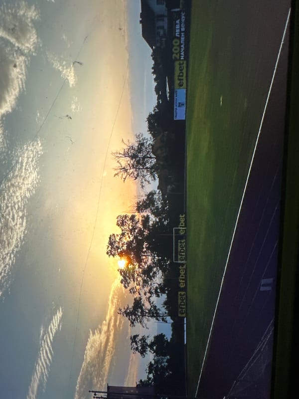 Empty stadium in Kostenets catches a vivid summer sunset